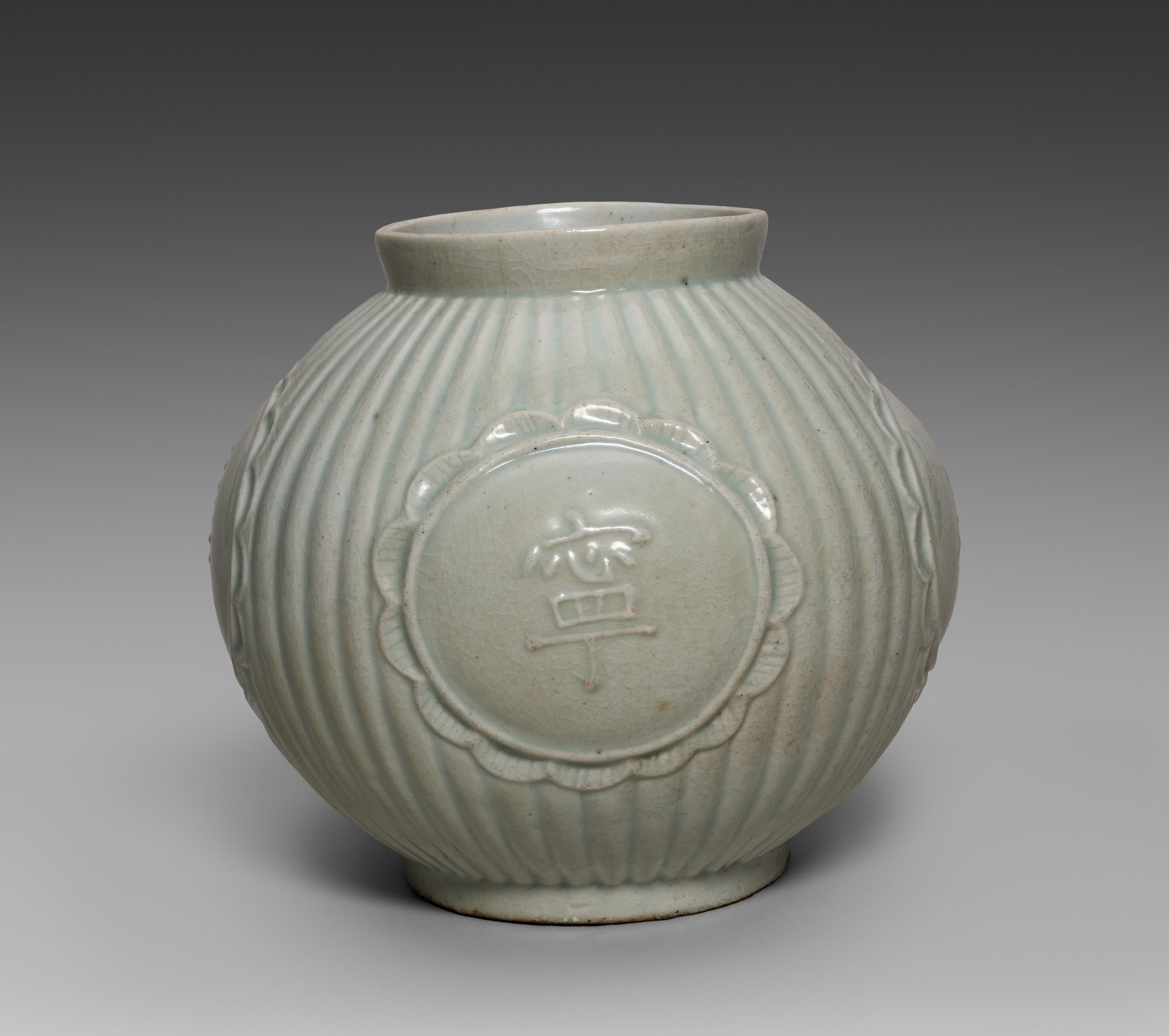 Jar with Four Auspicious Characters in Relief